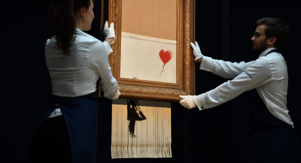 Shredded Banksy Painting Sells For $25.4 Million | The Dad